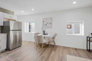 Dining room featuring light hardwood / wood-style flooring