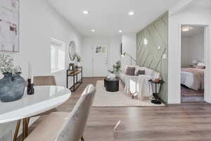 Living room with hardwood / wood-style flooring