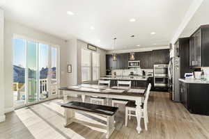 Dining area with sliding glass doors leading to the back patio