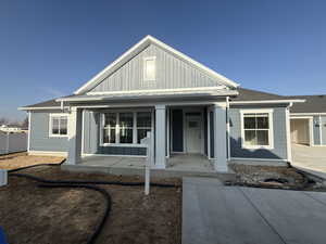 View of front of home with covered porch