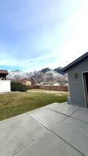 View of patio with a mountain view