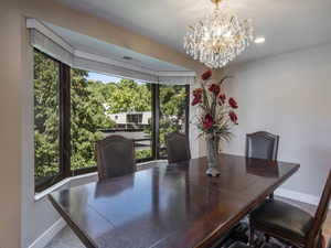 Dining space featuring an inviting chandelier