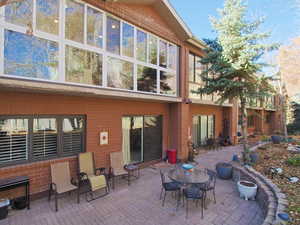 Rear view of house with a patio