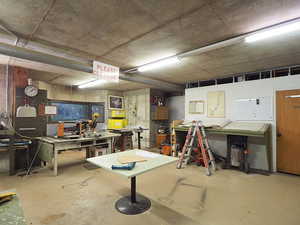 Interior space featuring a workshop area and concrete floors