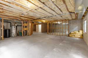 Basement featuring gas water heater