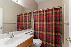 Bathroom with vanity and toilet