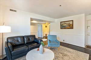 Living room featuring hardwood / wood-style floors