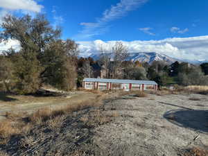 View of front of home featuring a mountain view