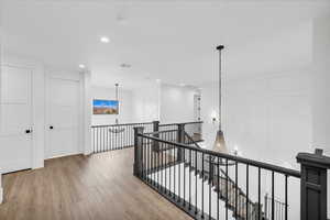 Hallway featuring hardwood / wood-style flooring