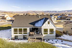 Rear view of property featuring a mountain view