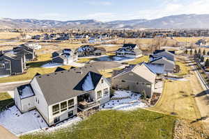 Birds eye view of property with a mountain view