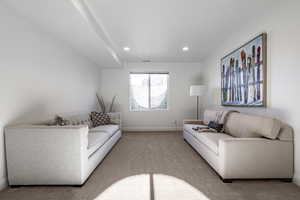 Living room with light colored carpet