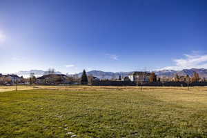 View of yard featuring a mountain view and a rural view