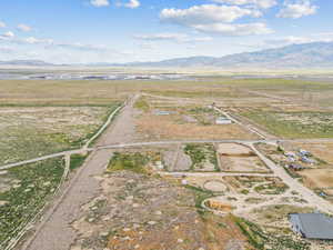 Drone / aerial view with a mountain view and a rural view