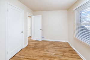 Bedroom with light wood-type flooring