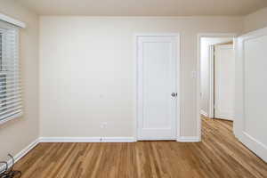 Bedroom with light wood-type flooring