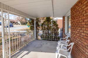 View of covered patio featuring a porch