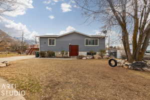 View of front of house with a mountain view