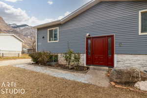 Doorway to property with a mountain view