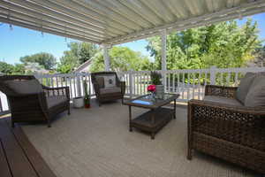 Deck with an outdoor living space