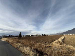 View of street featuring a mountain view and a rural view