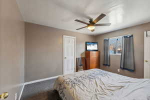 Primary Bedroom featuring carpet flooring and ceiling fan