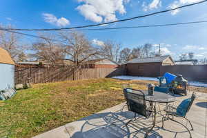 View of yard with a patio