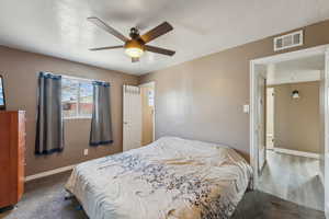 Primary Bedroom featuring carpet flooring and ceiling fan