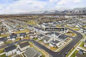 Birds eye view of property with a mountain view