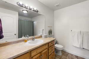 Master Bathroom with vanity and toilet