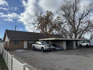 Ranch-style home with a carport