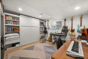 Office space featuring light hardwood / wood-style flooring