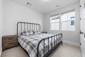 View of carpeted bedroom