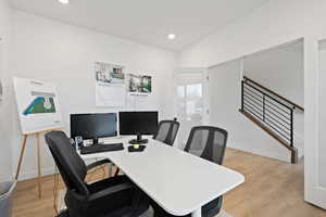 Office area featuring light wood-type flooring