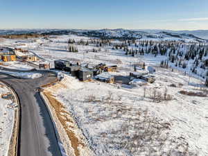 Snowy aerial view with a mountain view