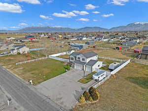 Birds eye view of property with a mountain view