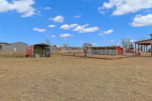 View of yard with an outbuilding