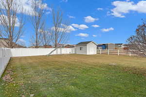 View of yard with an outbuilding