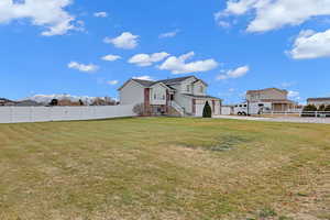 View of yard with a garage