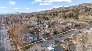 Birds eye view of property with a mountain view