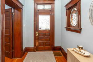 Entryway featuring light hardwood / wood-style floors and a healthy amount of sunlight