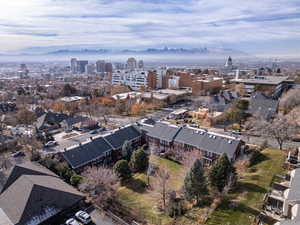 Birds eye view of property with a mountain view