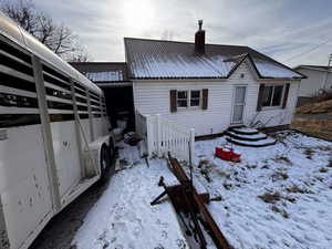 View of snow covered property