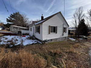 View of snow covered property