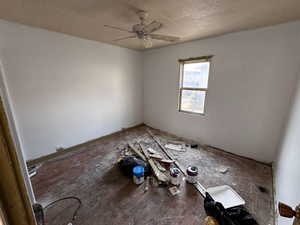 Unfurnished room with hardwood / wood-style flooring and ceiling fan