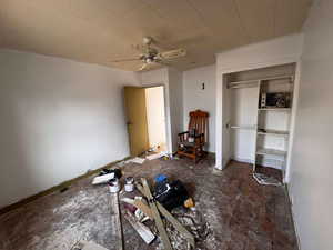 Unfurnished bedroom with ceiling fan