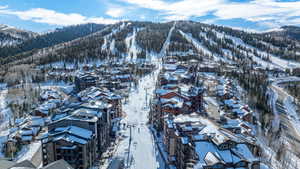 Snowy aerial view with a mountain view