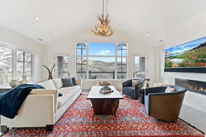 Living room with lofted ceiling