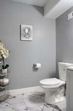 Bathroom with vanity and toilet