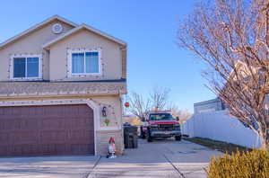 View of home's exterior featuring a garage